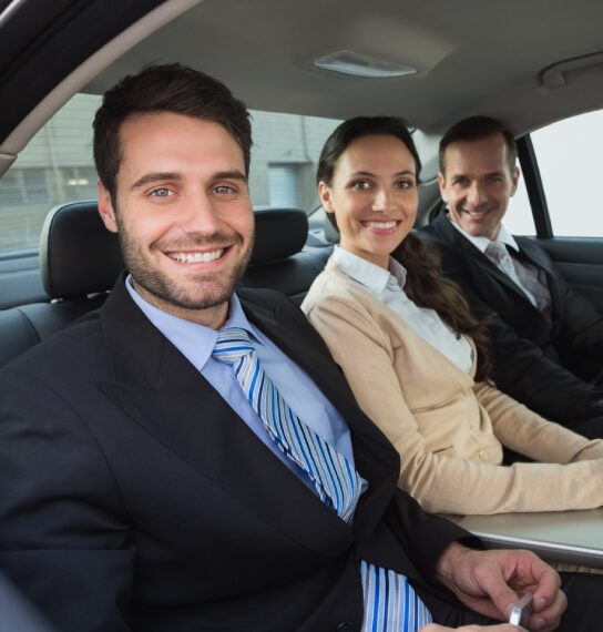 Happy colleagues commuting together